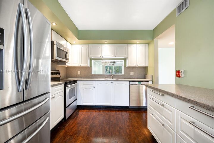 Property Photo:  1100 SW 130th Ave 304H  FL 33027 