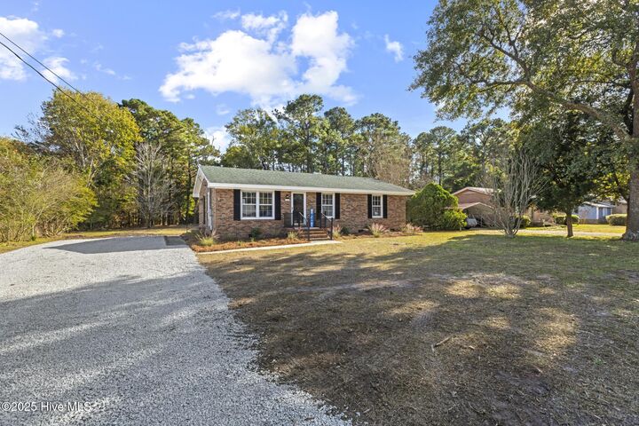 Property Photo:  1462 Country Club Drive  NC 28443 