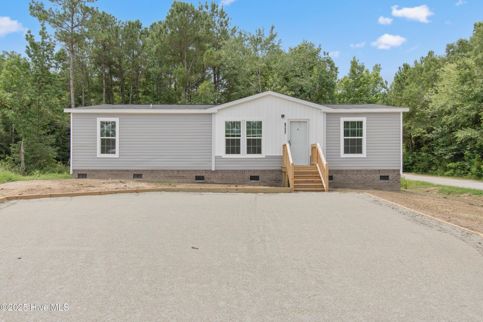 Property Photo:  6777 Lewis Drive SE  NC 28479 
