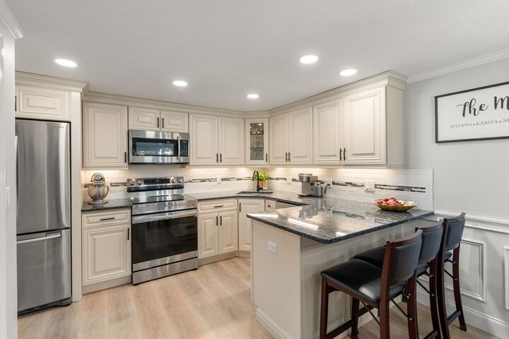 Property Photo:  596 Boston Post Rd E 23  MA 01752 