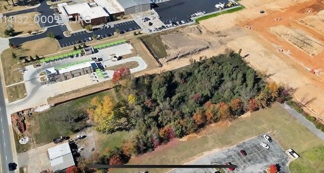 Property Photo:  901 SE Walton Boulevard  AR 72712 