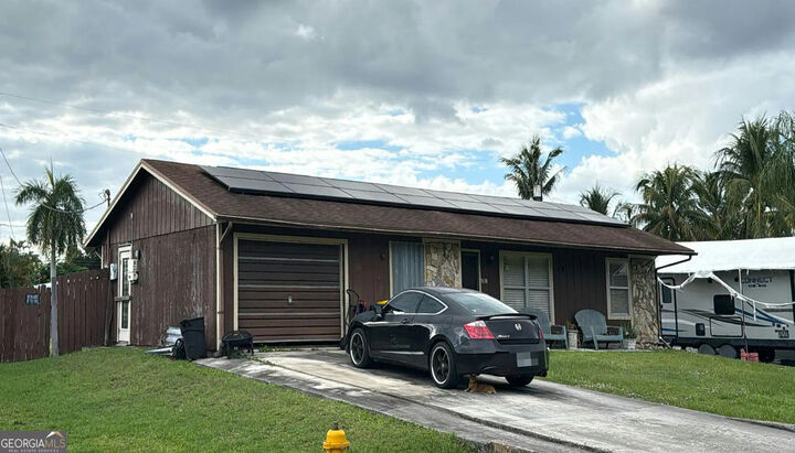 Property Photo:  5638 SE Pine Avenue  FL 34997 