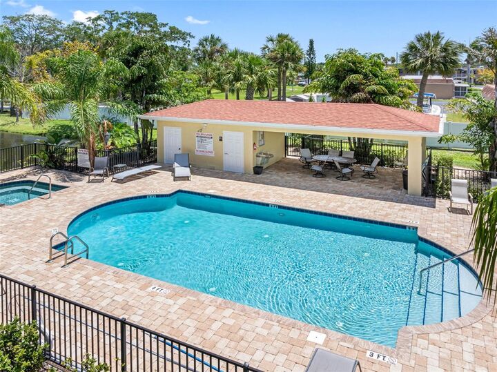 Property Photo:  5089 Royal Palms Way 202  FL 34652 