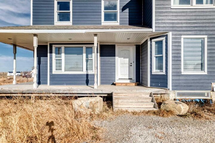 Property Photo: 266106 21 Street W AB T1S 1A2