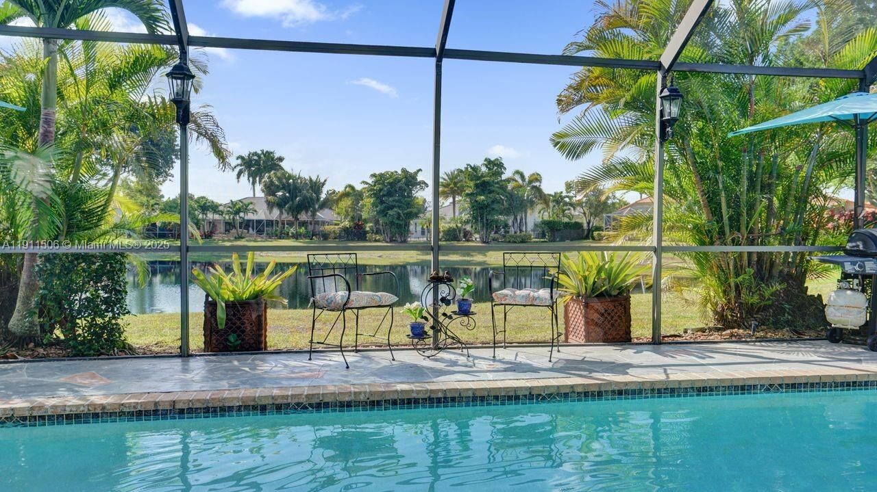 Property Photo: 10858 White Aspen Ln FL 33428