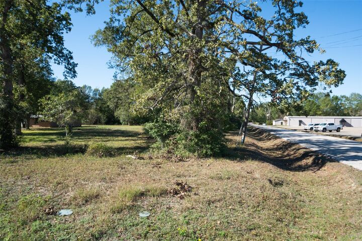 Property Photo:  10023 Airport Road  TX 77303 