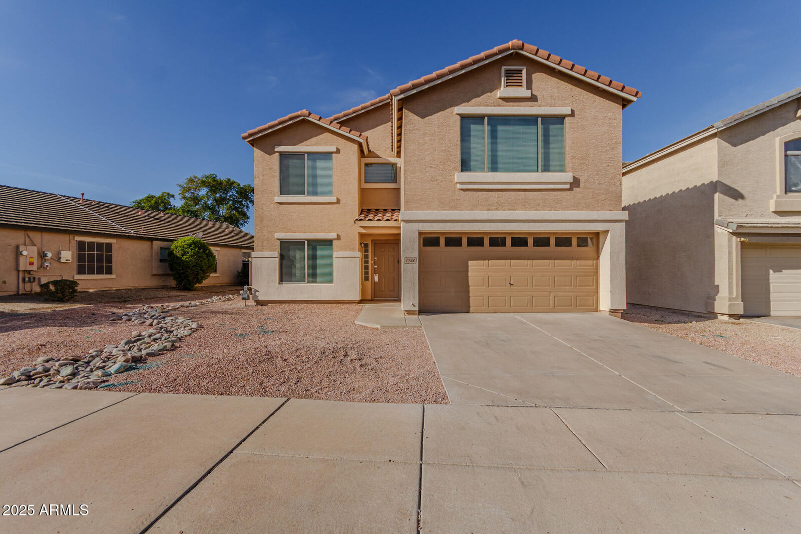 Property Photo: 7738 S 47th Lane AZ 85339