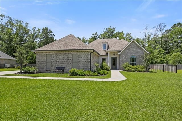 Property Photo: 343 Saw Grass Loop LA 70435