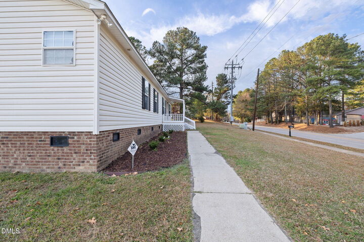Property Photo:  2850 Sanderford Road  NC 27610 