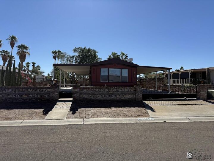 Property Photo: 13823 E 46 St AZ 85367