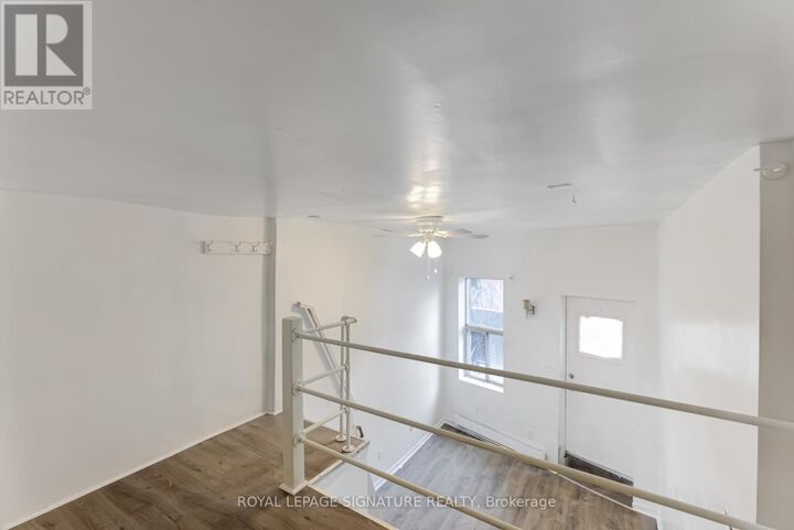 Property Photo:  3042 Dundas Street West Back  ON M6P 1Z5 