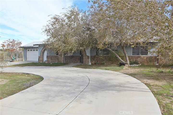 Property Photo:  10753 Pinon Avenue  CA 92345 