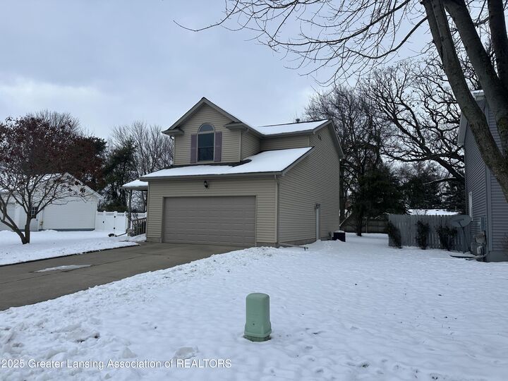 Property Photo:  1150 Porter Drive  MI 48813 