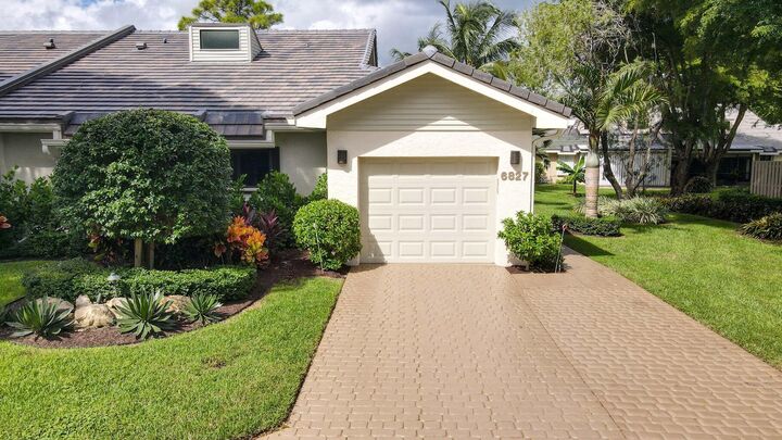 Property Photo:  6827 Parisian Way  FL 33467 