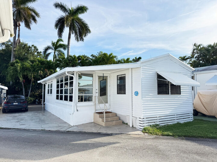 Property Photo: 210 Cardinal Drive B FL 33435