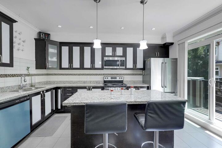 Property Photo: 6383 140 Street 9 BC V3W 0E9