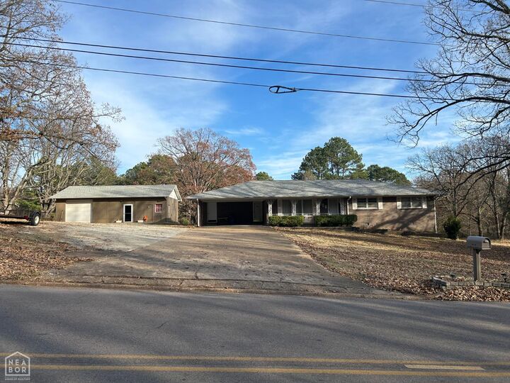 Property Photo:  1008 N Caraway Road  AR 72401 