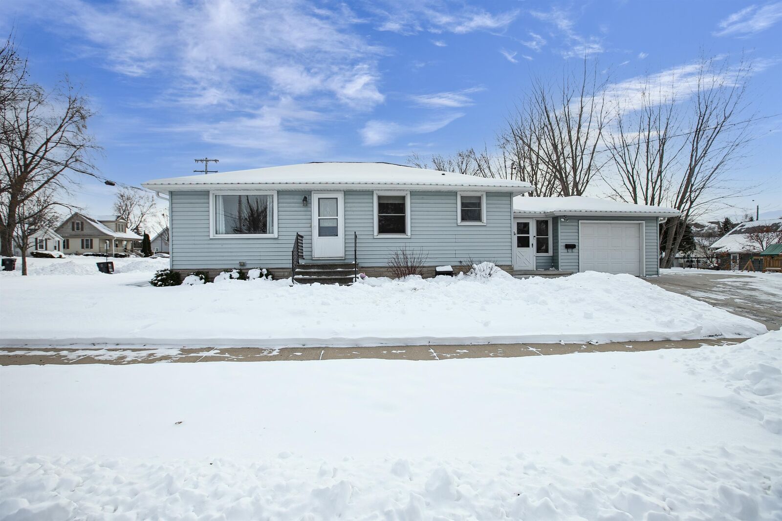 Property Photo:  217 E McKinley Avenue  WI 54140 