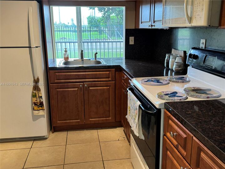 Property Photo: 9411 SW 4th St 111 FL 33174