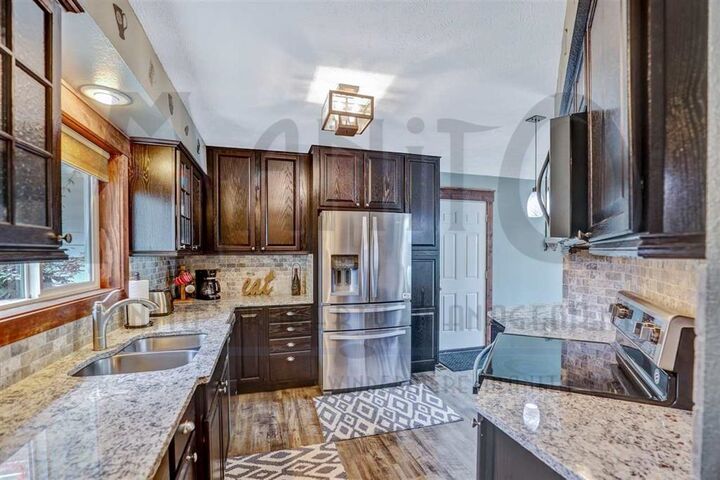 Property Photo:  2907 E 61st Ct  WA 99223 