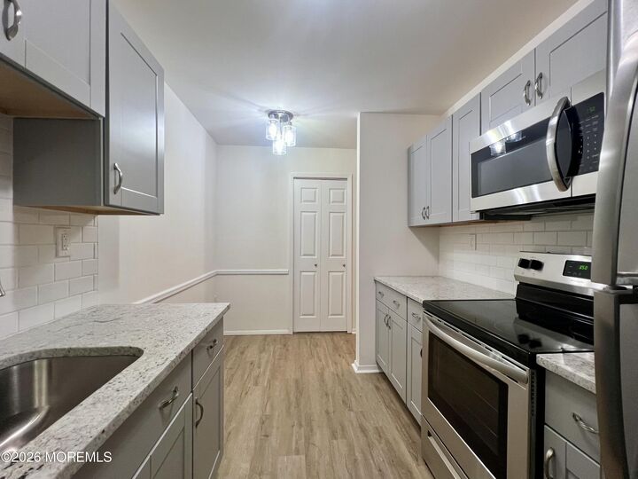 Property Photo:  159 Cross Slope Court B  NJ 07726 