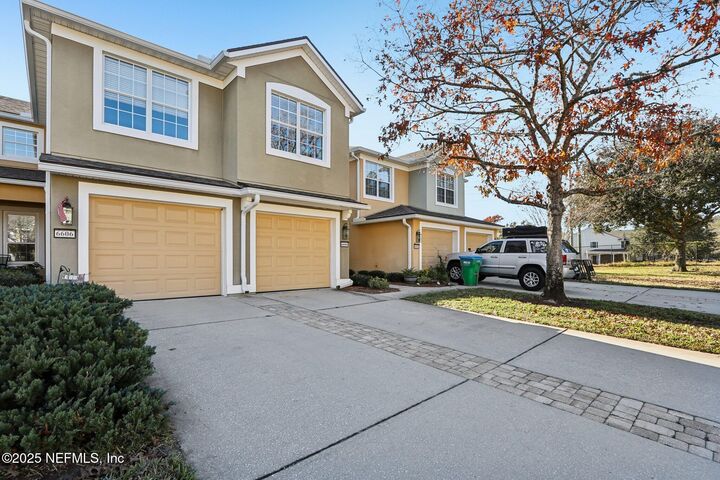 Property Photo:  6604 White Blossom Court 10H  FL 32258 