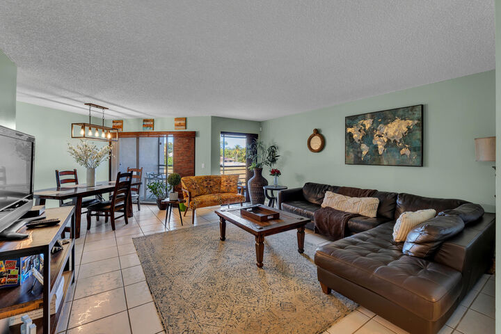 Property Photo:  5650 Camino Del Sol 205  FL 33433 