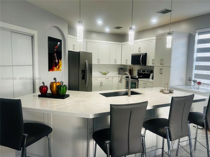 Property Photo:  13995 SW 154th St  FL 33177 