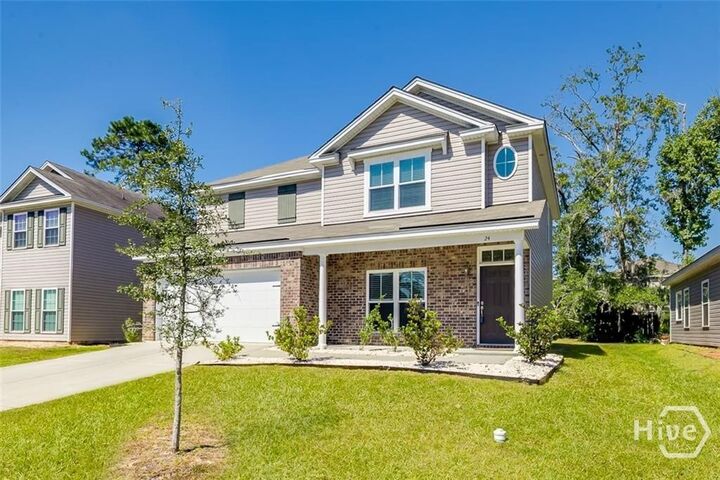 Property Photo:  24 Swallow Tail Circle  GA 31405 
