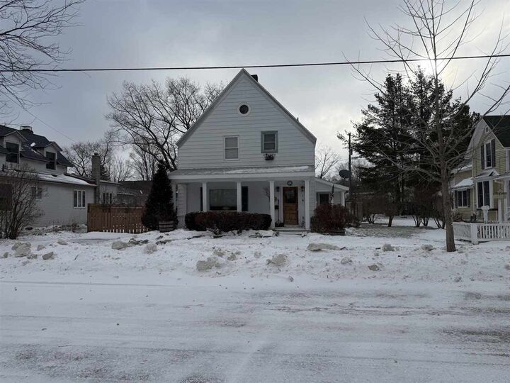 Property Photo:  114 E Hurlbut  MI 49720 