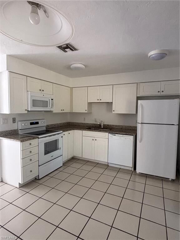 Property Photo: 125 Crown Dr FL 34110