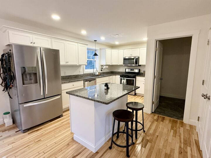 Property Photo: 28 Waterford Drive NH 03077