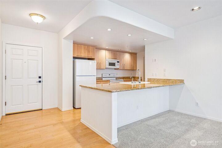 Property Photo:  3221 SW Avalon Way 313  WA 98126 