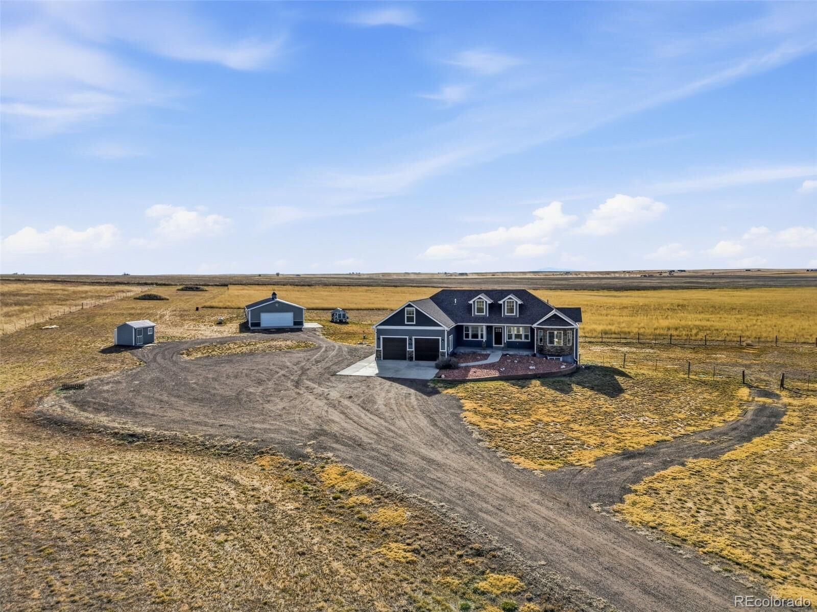Property Photo:  50950 E Maplewood Place  CO 80102 
