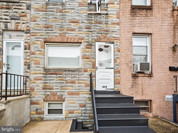 Property Photo:  419 W 23rd Street  MD 21211 