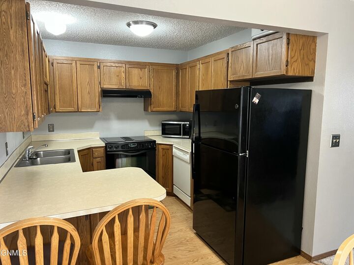 Property Photo:  2877 Warwick Loop D  ND 58504 