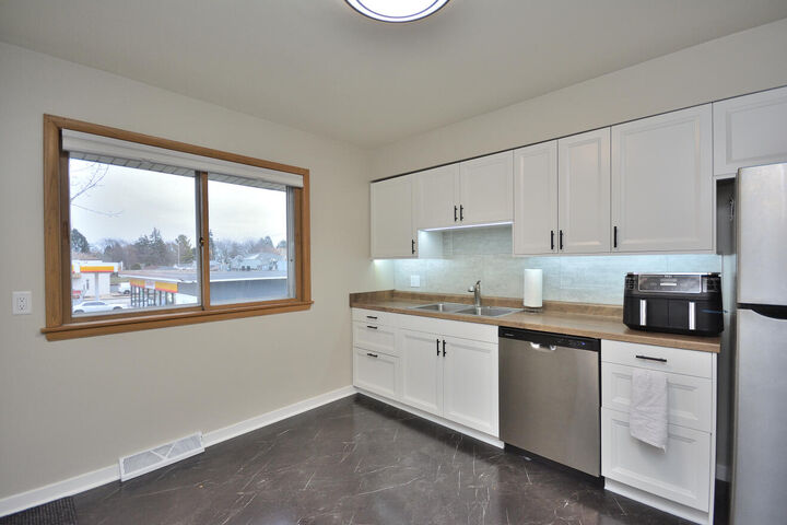 Property Photo:  5727 W Wisconsin Ave 5729  WI 53213 