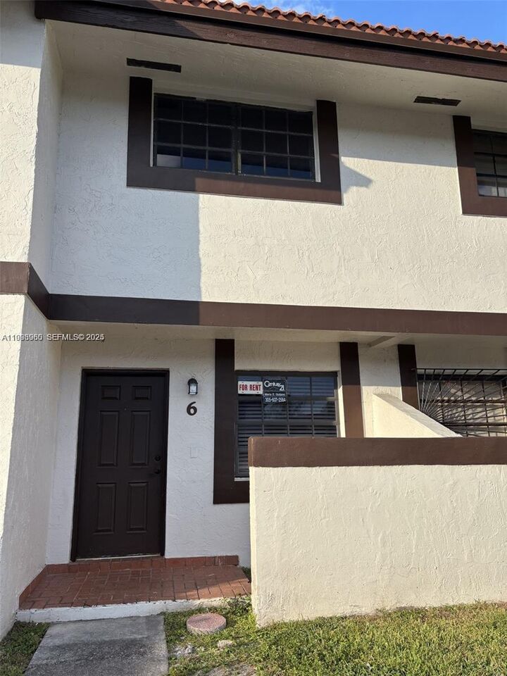 Property Photo:  13375 SW 57th Ter 7-6  FL 33183 