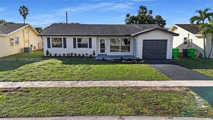 Property Photo:  11440 NW 46th Pl  FL 33323 