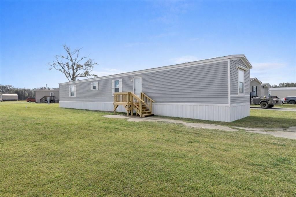 Property Photo:  583 I-10 Mobile Village Rd 55  LA 70615 