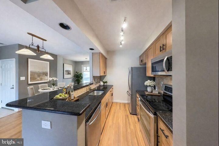 Property Photo:  5917 Barbados Place 103  MD 20852 