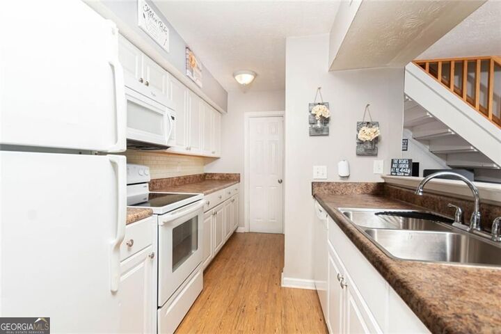 Property Photo:  1348 Surrey Lane SW  GA 30008 