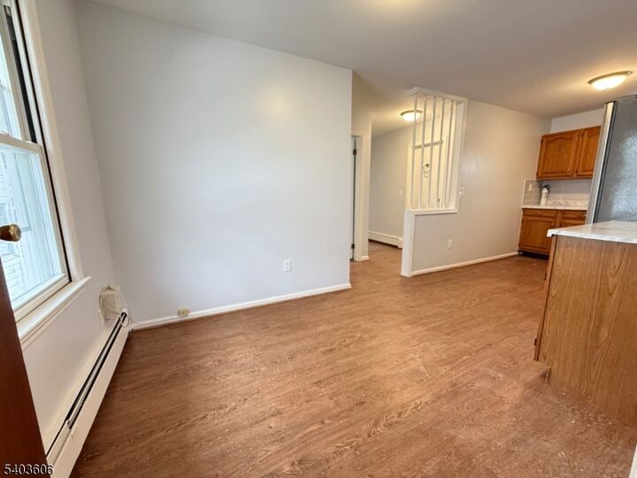 Property Photo:  50 Buschmann Ave 2  NJ 07508 