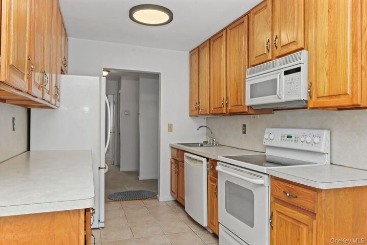 Property Photo:  58 Coachlight Square  NY 10548 