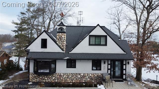 Property Photo: 910 W Pine Tree Road W MI 48362