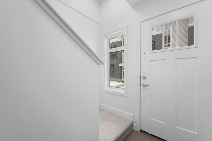 Property Photo:  857 Belmont Drive SW #210  AB T2X 4P2 