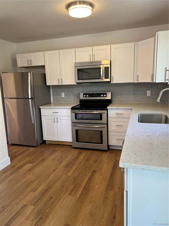 Property Photo:  3287 S Dudley Street  CO 80227 