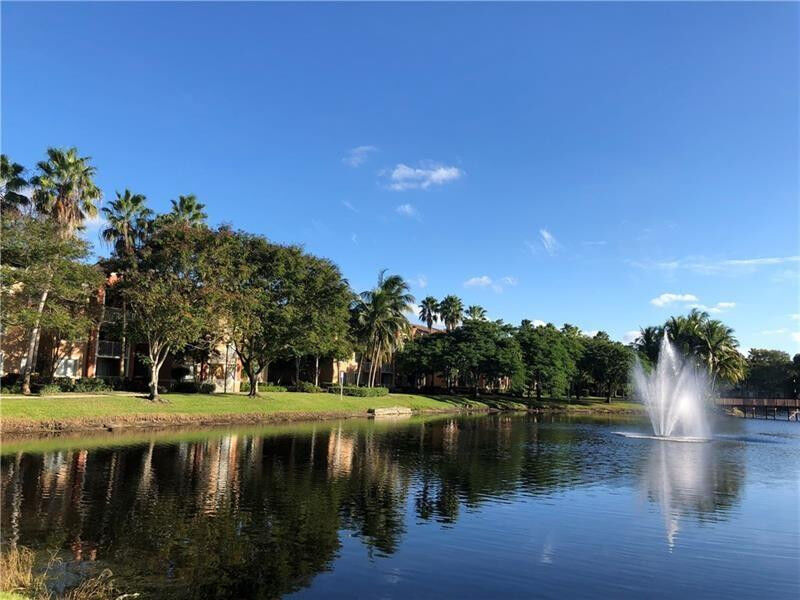 Property Photo:  3874 Lyons Road 304-6  FL 33073 