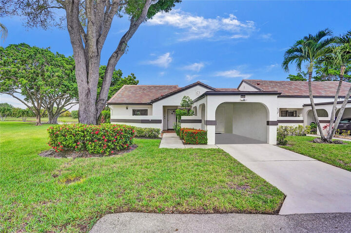 Property Photo: 5658 Parkwalk Circle FL 33472