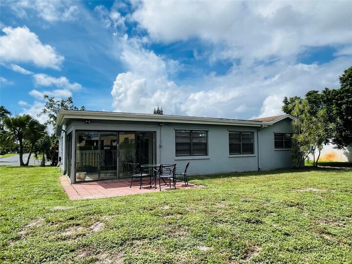 Property Photo:  6111 Rainbow Circle  FL 33463 